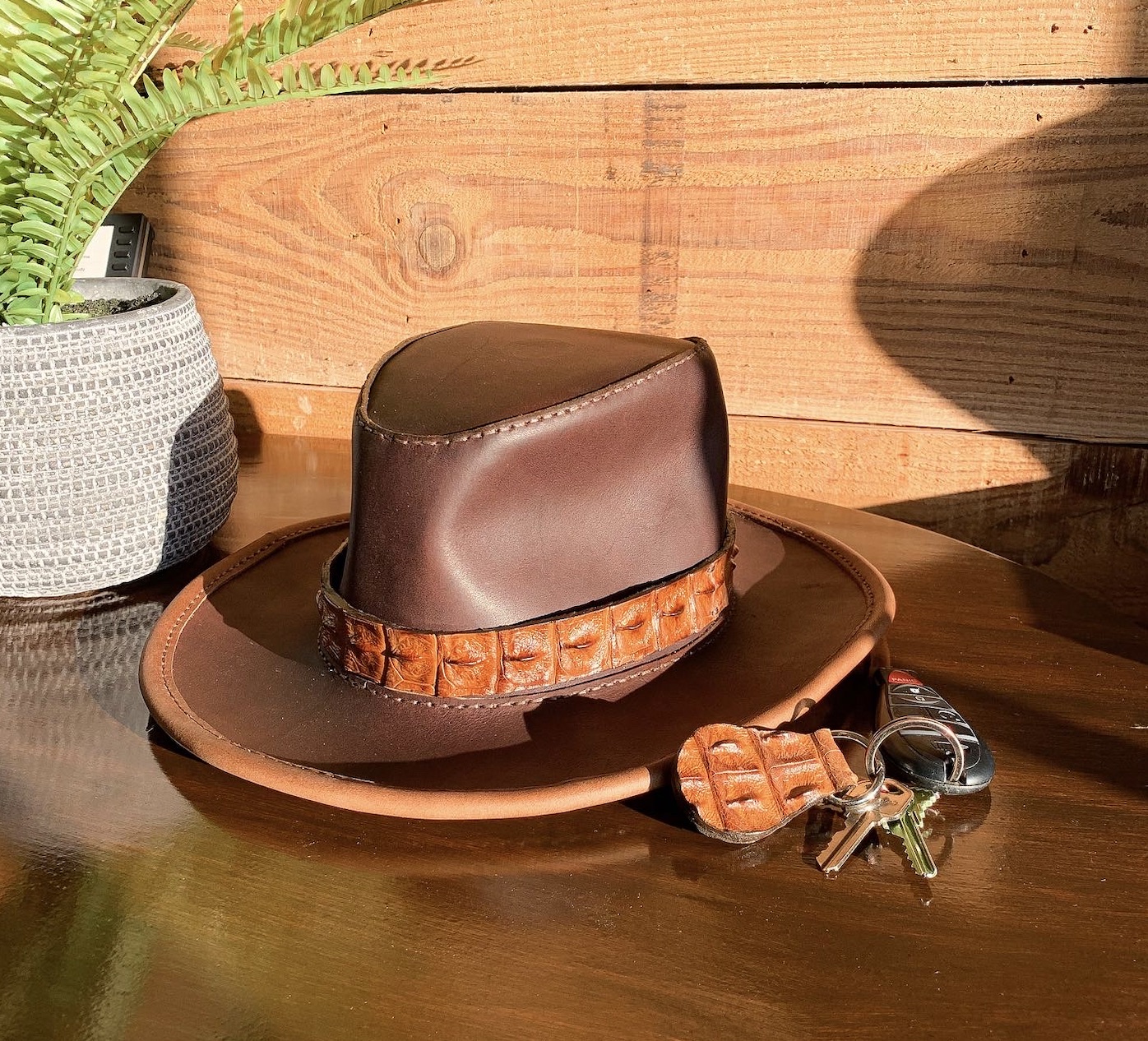 Handcrafted leather hat with gator band