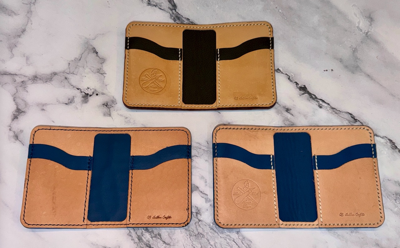 Vertical leather bifold wallets